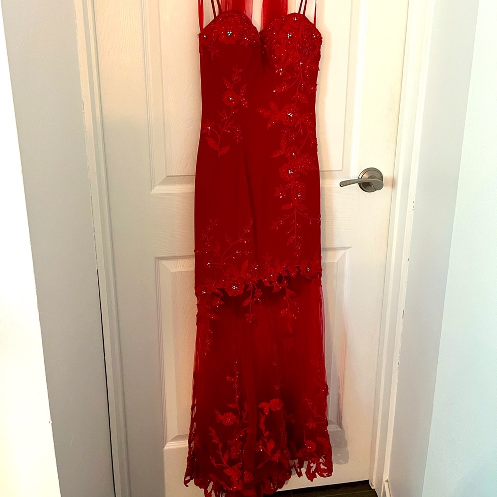 Red embroidered beaded grad dress. Formal gown